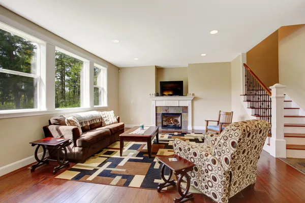 Soft tones living room with fireplace and tv — Stock Photo, Image