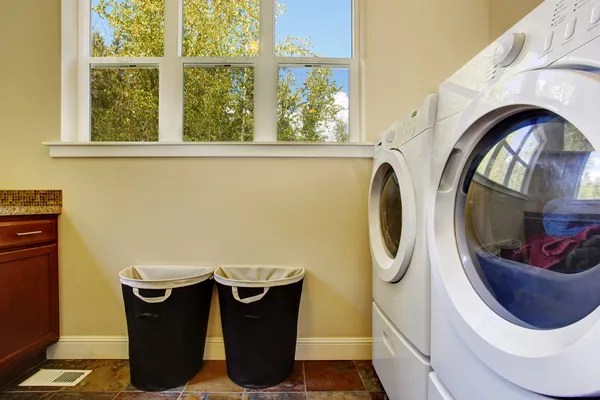 Bright ivory laundry room — Stock Photo, Image