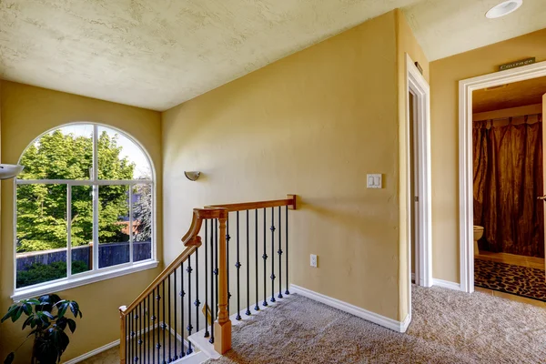 Upstairs hallway with staircase — Stock Photo, Image