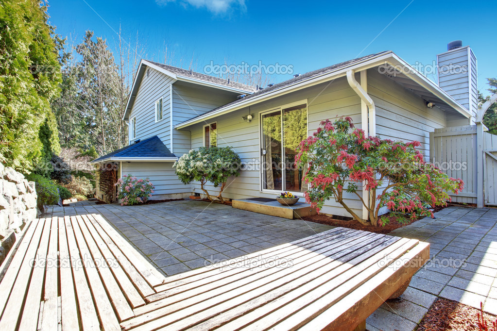 House backyard with wooden deck 