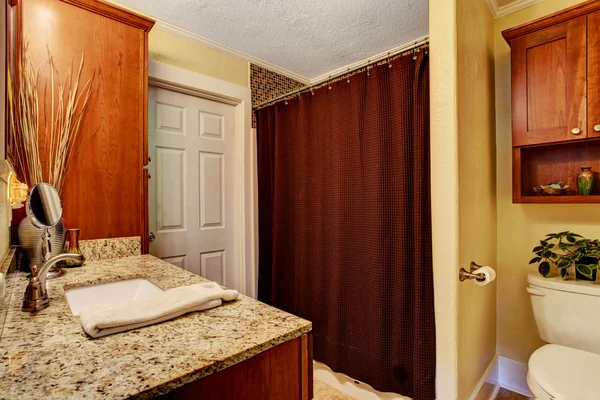 Bathroom interior with granite top cabinet — Stock Photo, Image