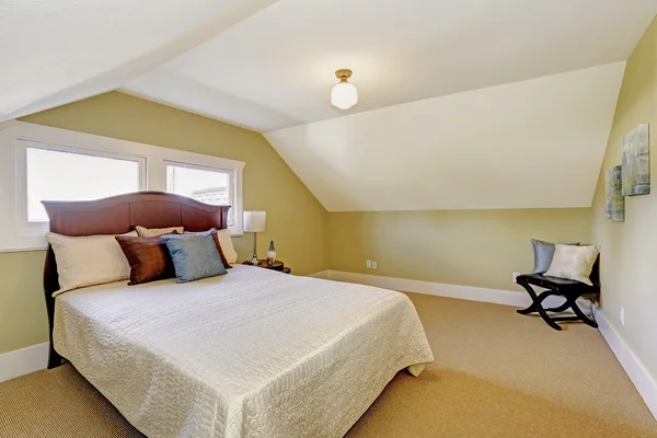 Bedroom interior with vaulted ceiling. — Stock Photo, Image