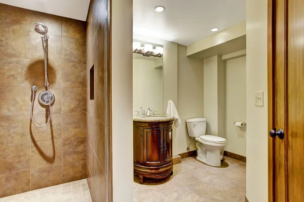 Bathroom interior with carved wood vanity cabinet — ストック写真