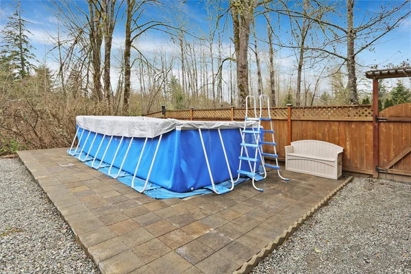 Backyard with jacuzzi  during early spring — Stock Photo, Image