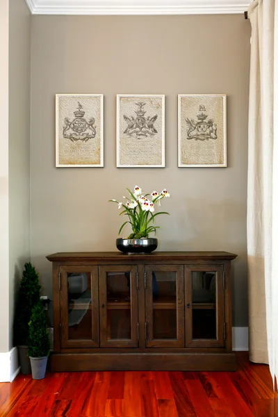 Glass door cabinet decorated with flowers — Stock Photo, Image