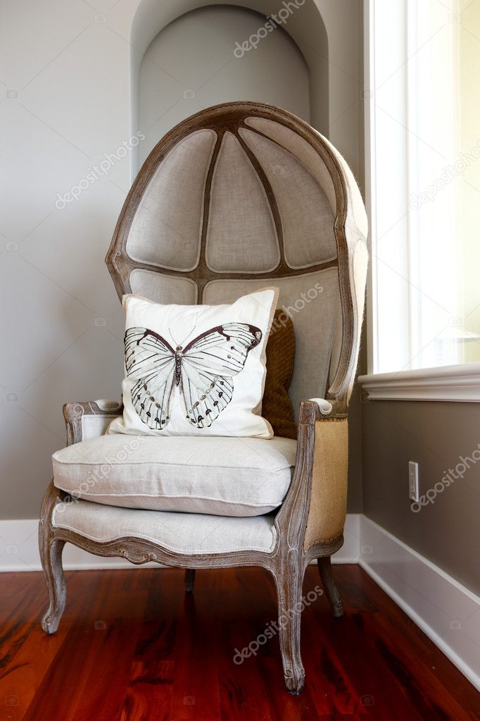 Antique hood chair with  pillows