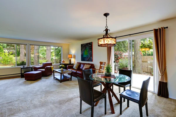 House interior with open floor plan. Living room with dining area — Stock Photo, Image