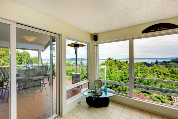 Sun room interior with door to walkout deck — Stock Photo, Image