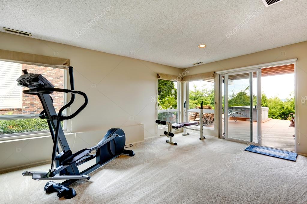 House gym room with exit to backyard — Stock Photo © iriana88w 51260903