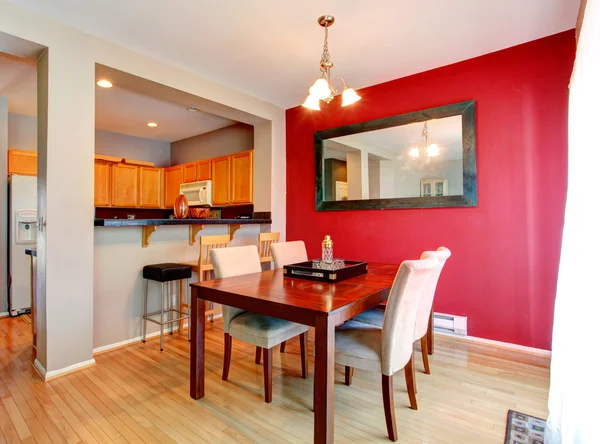 Dining room with contrast red wall — Stock Photo, Image