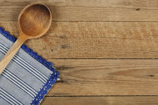 Ladle and tablecloth — Stock Photo, Image