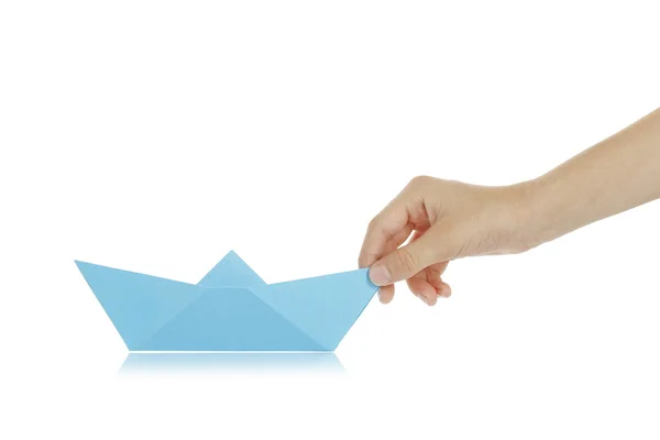 Guiding a paper boat — Stock Photo, Image