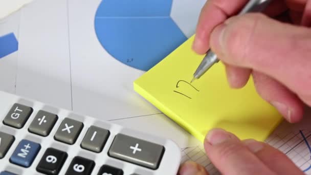 Closeup Man Taking Notes Yellow Sticky Notes — Stok Video