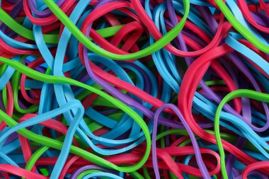 Arkaplan olarak renkli lastik bantları kapat