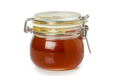 Beyaz üzerine izole edilmiş bal kavanozu