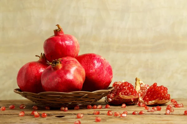Basket Organic Pomegranates Wooden Table Copy Space — Stock Photo, Image