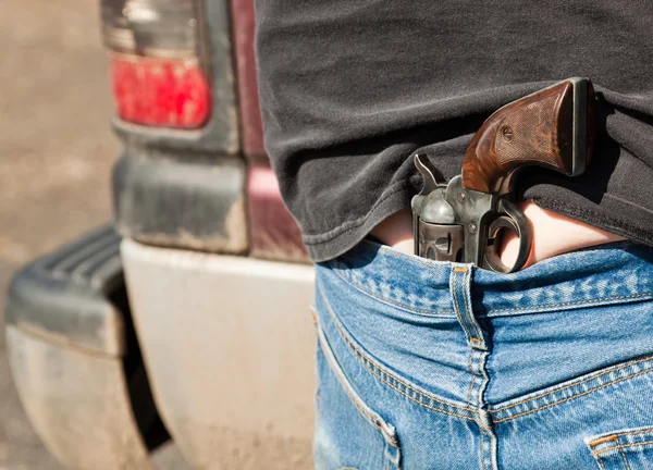Pistole in Jeans versteckt — Stockfoto