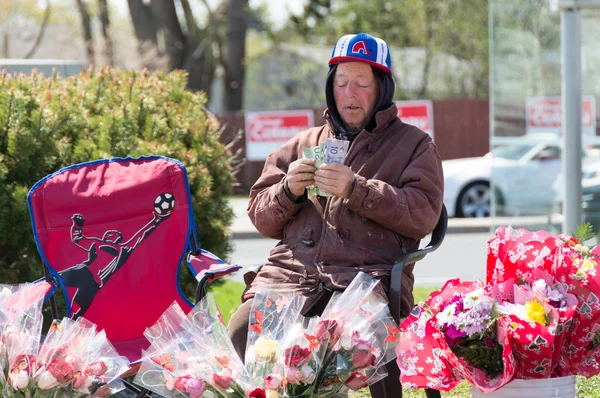 Canadian Senior Citizen Selling Flowers on Mother's Day