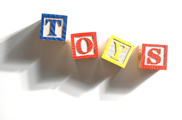 Alphabet Blocks spelling the words toys — Stock Photo, Image