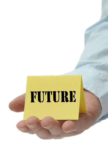 Businessman holding yellow future sign — Stock Photo, Image