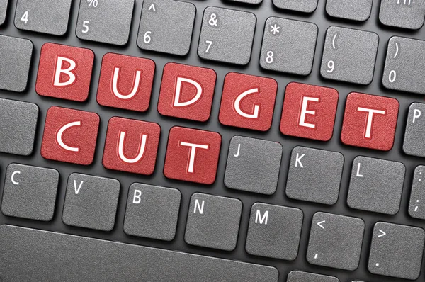 Бюджет сокращен на клавиатуре — стоковое фото