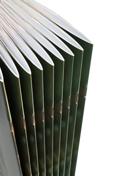 Stack of black covered magazines — Stock Photo, Image