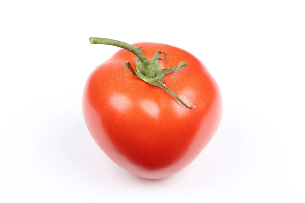 Färsk tomat på vit bakgrund — Stockfoto
