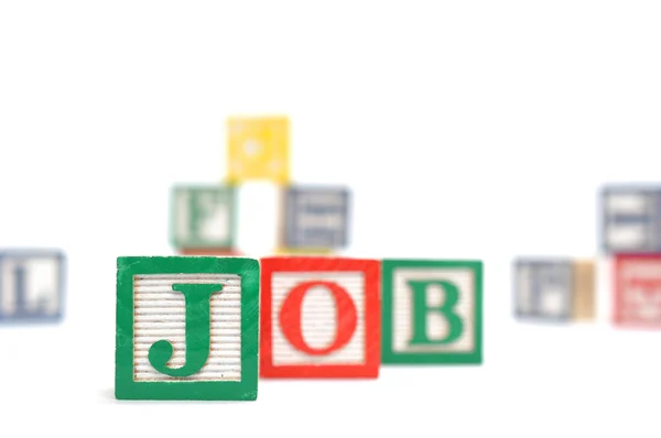 Alphabet Blocks spelling the words job — Stock Photo, Image