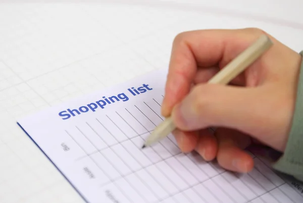 Writing shopping list — Stock Photo, Image