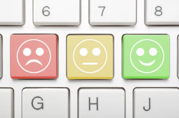 Three different kind face symbol on keyboard — Stock Photo, Image
