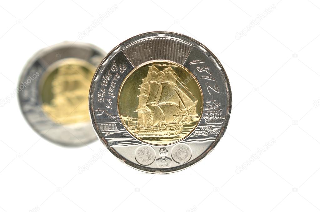Two dollar coins isolated