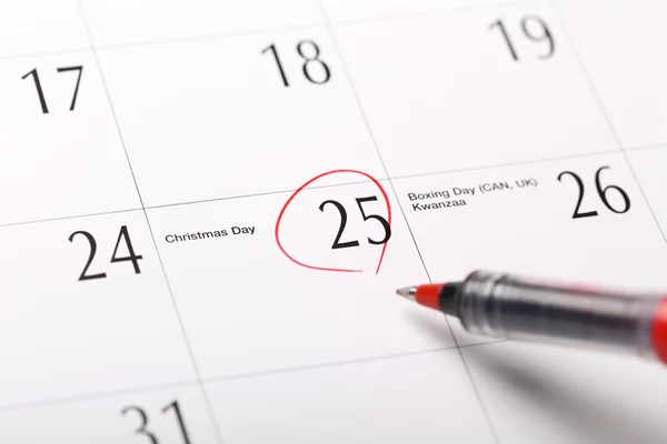 Uma data circulada em um calendário — Fotografia de Stock