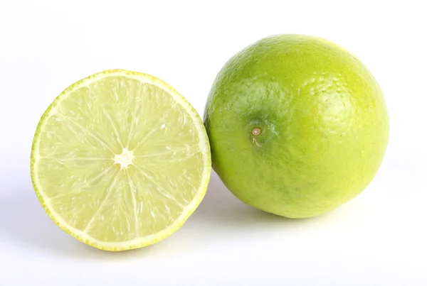 Fresh limes on white background — Stock Photo, Image