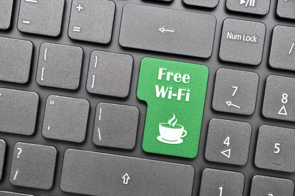 Free wifi in coffee shop on keyboard — Stock Photo, Image