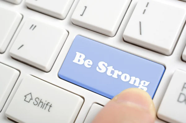 Pressing be strong key on keyboard — Stock Photo, Image