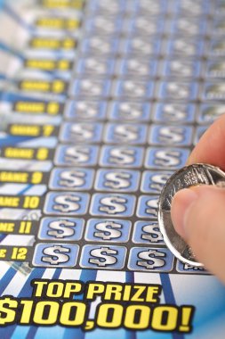 Scratching lottery ticket clipart