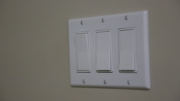 Close up clips of woman's had turning light off — Stock Video