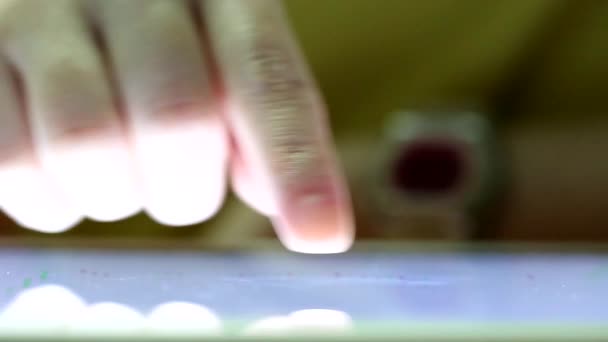 Closeup finger touching tablet computer touchscreen — Stock Video