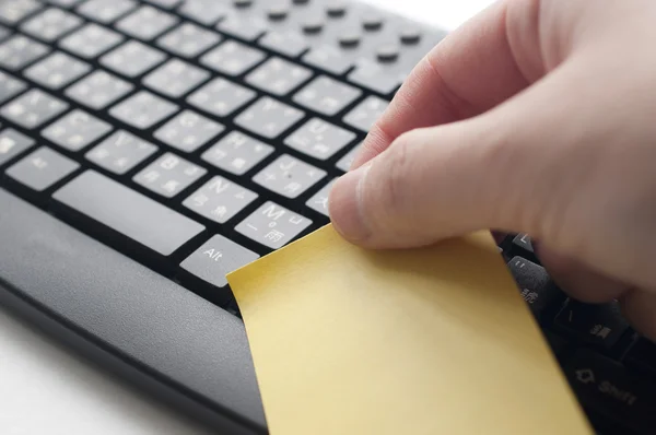 Putting memo on Chinese keyboard — Stock Photo, Image