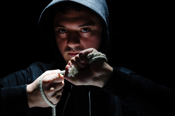 Dangerous hooded male