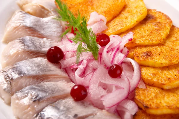 Herring with fried potatoes — Stock Photo, Image