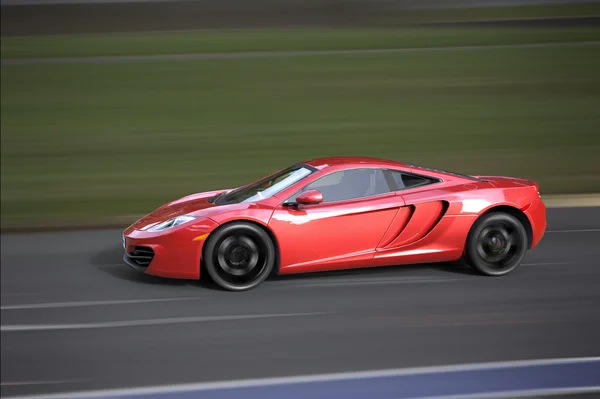 Fast sportcar on a track — Stock Photo, Image