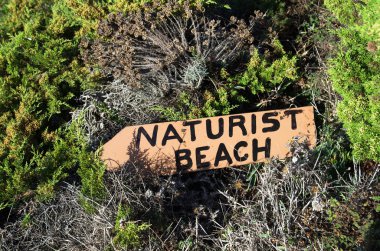 Naturist beach sign clipart