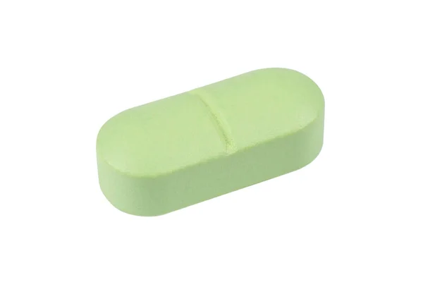 Makró Feles Zöld Tabletta Tabletta Izolált Fehér Alapon Gyógyszerészeti Termékek — Stock Fotó