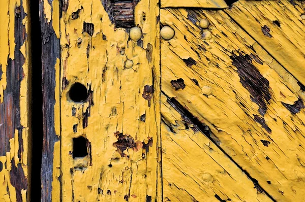 Old yellow wooden door — Stock Photo, Image