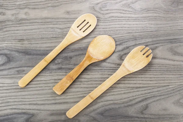 Wooden Spoon Set on Aged Wood — Stock Photo, Image