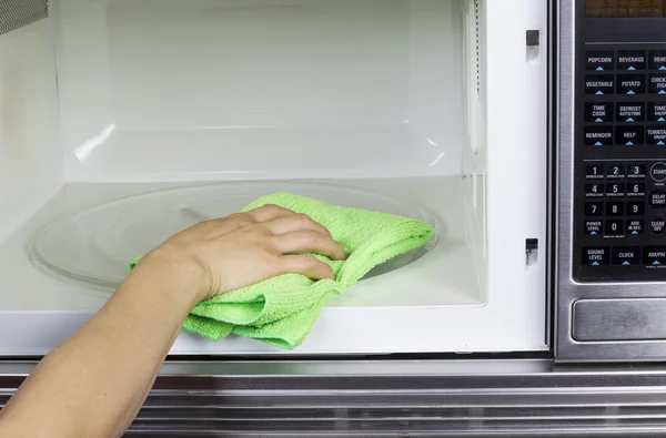 Cleaning inside of Microwave Oven — Stock Photo, Image