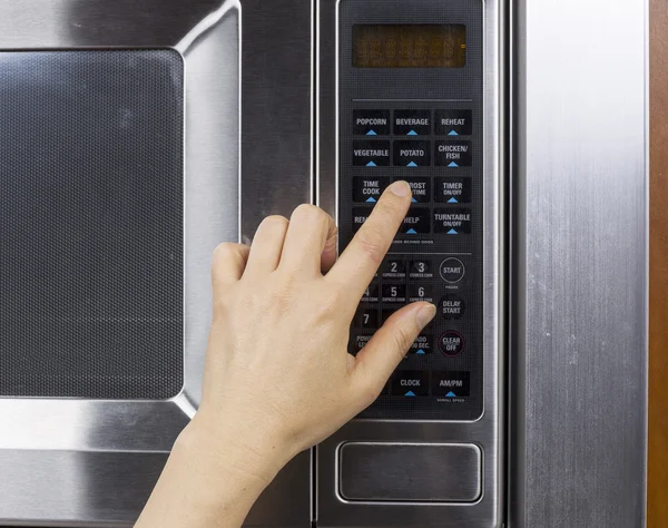 Using Microwave Oven — Stock Photo, Image