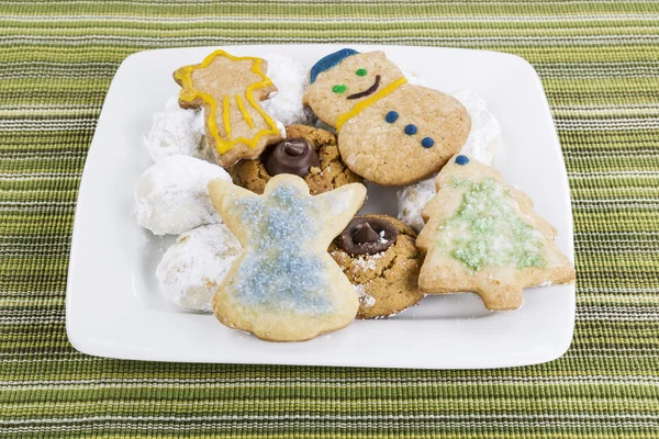Assortment of Holiday Cookies on White Square Plate — Stock Photo, Image