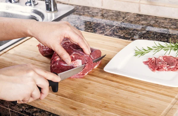 Cutting Thin Slices of Lean Red Lamb Meat — Stock Photo, Image